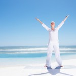 Full length image of an old woman performing yoga at the beach The "sunshine vitamin" may help older people preserve muscle strength.